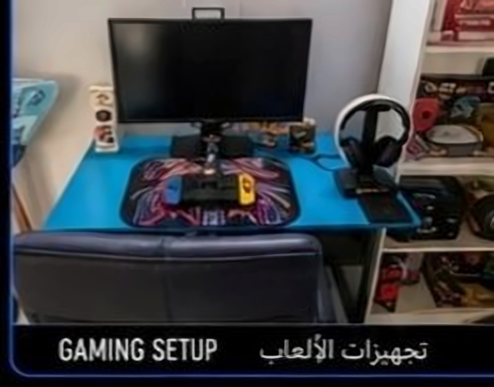 Desk setup with monitor, headset and RGB